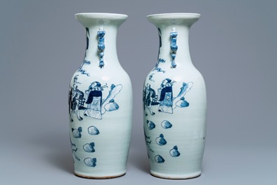 A pair of Chinese blue and white celadon vases with figures, 19th C.