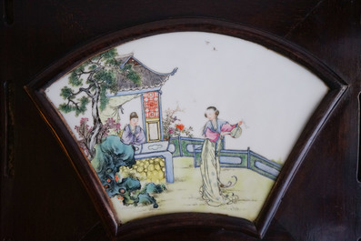 A Chinese wooden room divider with famille rose 'Romance of the Western Chamber' plaques, Republic