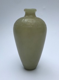 A Chinese light celadon jade meiping vase with archaic design, 19/20th C.