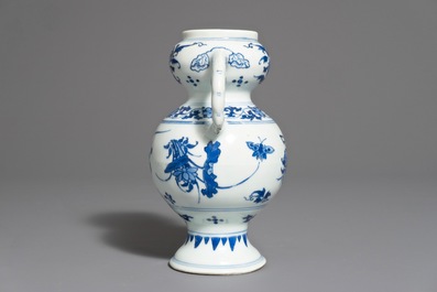 A Chinese blue and white vase with floral design, Transitional period