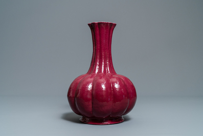 A Chinese monochrome ruby red vase, Qianlong mark, 19th C.