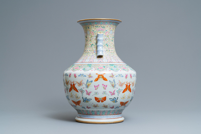 A Chinese famille rose 'hu' vase with butterflies, Qianlong merk, 20th C.