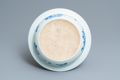 A Chinese blue and white basin with floral design, 19th C.