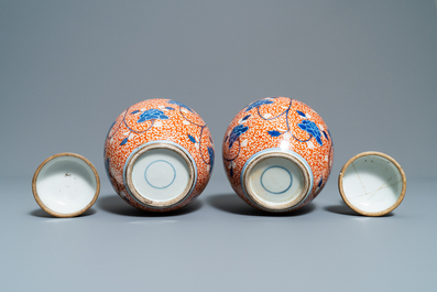 Two pairs of Chinese coral-ground jars and a flamb&eacute;-glazed bottle vase, 19/20th C.