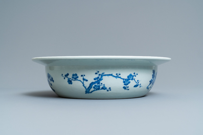 A Chinese blue and white basin with floral design, 19th C.