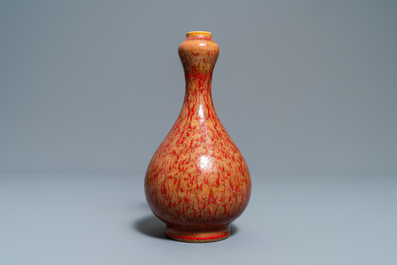 Two pairs of Chinese coral-ground jars and a flamb&eacute;-glazed bottle vase, 19/20th C.