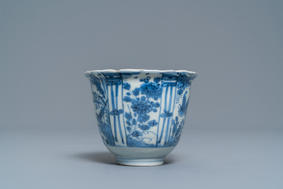 Two small Chinese blue and white plates and a crow cup, Kangxi and Wanli