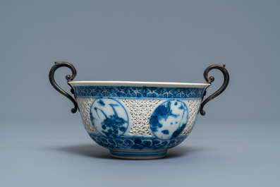 A Chinese silver-mounted blue and white reticulated bowl, Transitional period