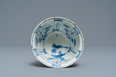 Two small Chinese blue and white plates and a crow cup, Kangxi and Wanli