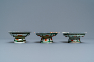 A Chinese famille rose teapot, a covered bowl and three Bencharong bowls on stand, 19th C.