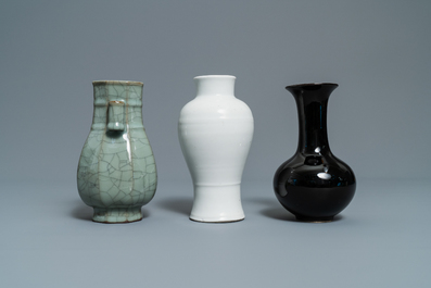 Eleven monochrome Chinese porcelain and Beijing glass vases, Kangxi and later