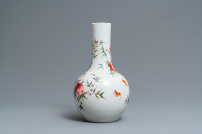 A Chinese famille rose 'nine peaches' bottle vase, Guangxu mark, 19/20th C.