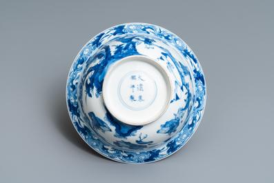 A Chinese blue and white klapmuts bowl with figures in a landscape, Kangxi mark and of the period