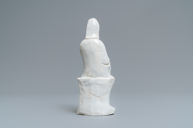 A Chinese Dehua blanc de Chine model of a Guanyin with child, Kangxi