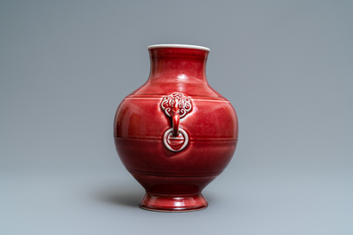 A Chinese monochrome sang-de-boeuf 'hu' vase, Qianlong mark, 19/20th C.