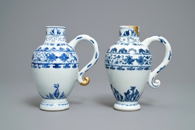 A pair of Chinese blue and white ewers, Transitional period