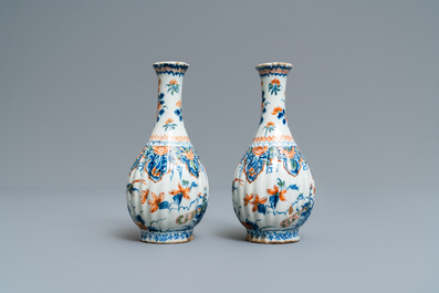 A pair of ribbed Dutch Delft cashmere palette bottle vases, 1st quarter 18th C.