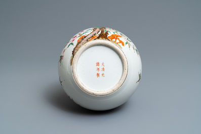 A Chinese famille rose 'nine peaches' bottle vase, Guangxu mark, 19/20th C.