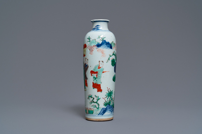 A Chinese wucai rouleau vase with figures in a landscape, Transitional period