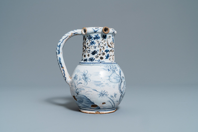 A blue and white Lille faience puzzle jug, 18th C.