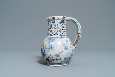 A blue and white Lille faience puzzle jug, 18th C.