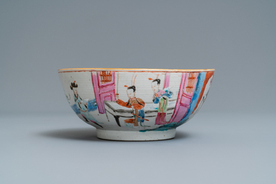 A Chinese famille rose bowl with figures in an interior, Yongzheng