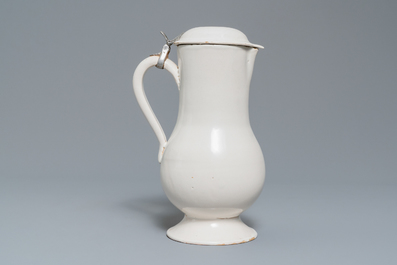 A white Delftware jug and cover, 18th C.