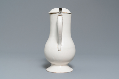 A white Delftware jug and cover, 18th C.