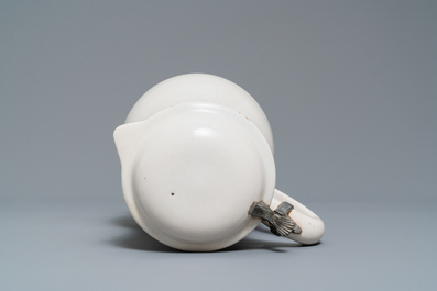 A white Delftware jug and cover, 18th C.