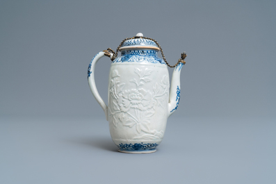 A large Japanese blue and white moulded Arita teapot with gilt silver mounts, Edo, 17th C.