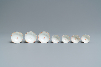 Seven Chinese famille rose 'Mandarin' cups and saucers, Qianlong