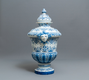 A massive Dutch Delft blue and white urn and cover, 19th C.