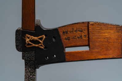 A Japanese aogai-nashiji 'kura' saddle with associated 'abumi' stirrups, Muromachi, 16th C.