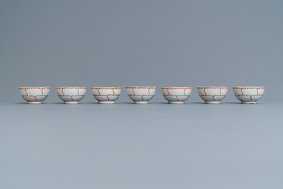 A Chinese iron-red and gilt 30-piece tea service with a butterfly, Qianlong