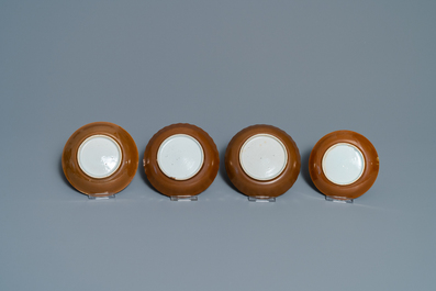 Eight Chinese famille rose, blue and white and iron-red capucin-ground cups and saucers, Kangxi/Qianlong