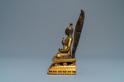 A Sino-Tibetan gilt bronze and copper repouss&eacute; figure of Buddha, 17/18th C.