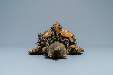 A large Sino-Tibetan coral-inlaid gilt bronze figure of Kapaladhara Hevajra, 18/19th C.