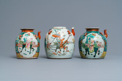 Two large Chinese blue and white and three famille rose teapots, 19/20th C.