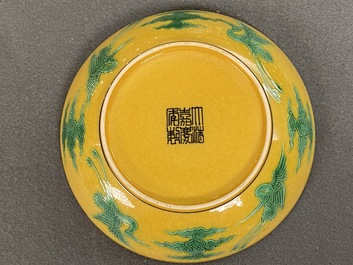 A Chinese yellow-ground green and aubergine 'dragon' dish, Jiaqing mark, 19/20th C.