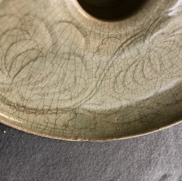 A Chinese Yaozhou celadon bowl with incised floral design, Song or later