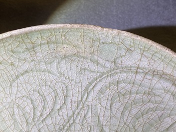 A Chinese Yaozhou celadon bowl with incised floral design, Song or later