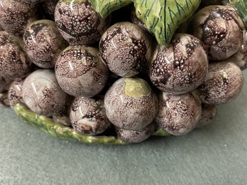 A polychrome Dutch Delft 'bunch of grapes' box and cover, 18th C.