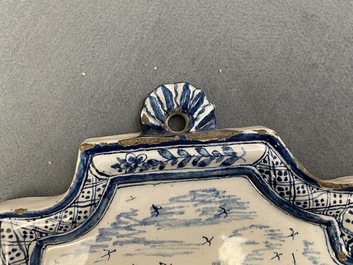 A Dutch Delft blue and white 'maritime subject' plaque, 18th C.