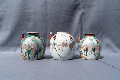 Two large Chinese blue and white and three famille rose teapots, 19/20th C.