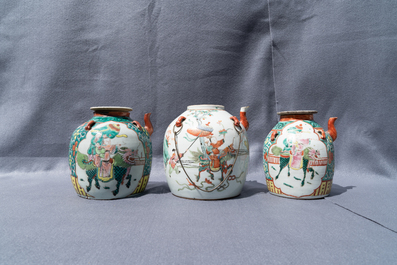 Two large Chinese blue and white and three famille rose teapots, 19/20th C.