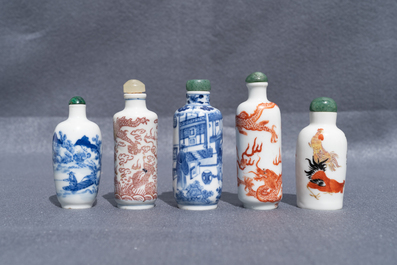 Five Chinese blue and white, iron- and copper-red snuff bottles, 19th C.