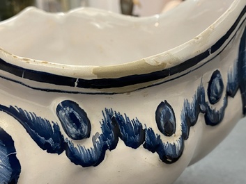 A blue and white Brussels faience rocaille tureen and cover, 18th C.