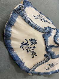 A blue and white Brussels faience rocaille tureen and cover, 18th C.