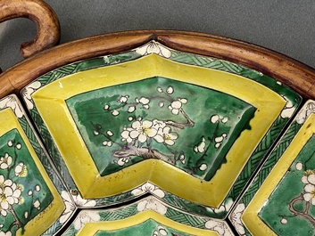 A Chinese verte biscuit sweetmeat set on wooden tray, Kangxi