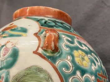 Two large Chinese blue and white and three famille rose teapots, 19/20th C.